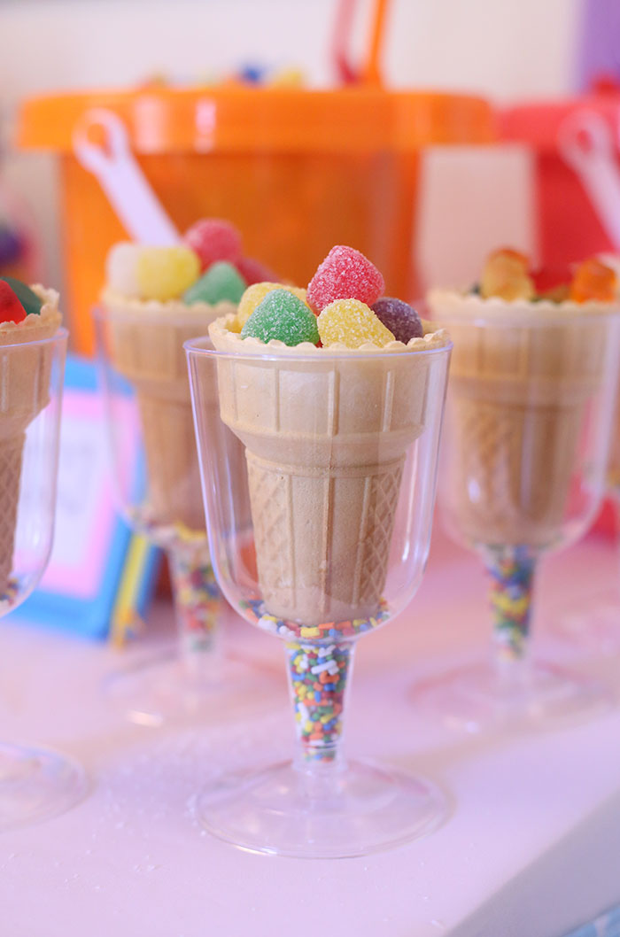 DIY Candy Buffet! Super easy and so fun. Use bright and whimsical colors to make it more magical. 