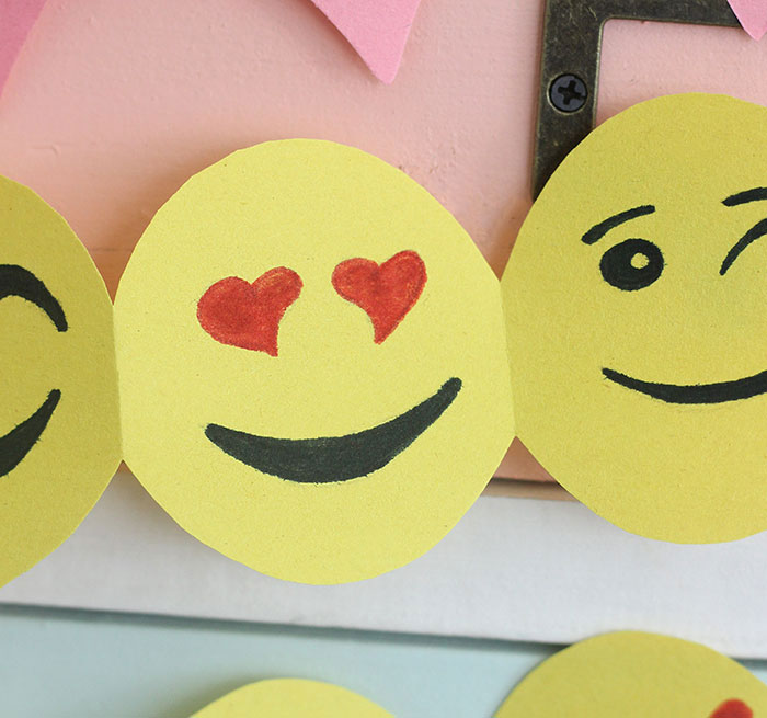 Emoji Paper Garland. an easy tutorial to make Emoji Paper Garland that will make back to school a little more fun.