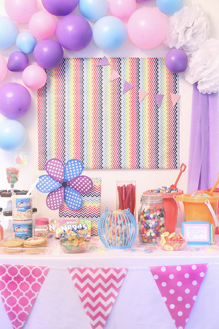 DIY Candy Buffet! Super easy and so fun. Use bright and whimsical colors to make it more magical. 