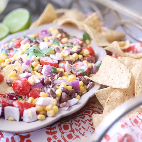 Black Bean & Corn Salsa with a creamy lime dressing. SO easy and so fresh.