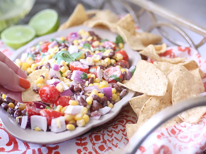Black Bean & Corn Salsa with a creamy lime dressing. SO easy and so fresh.
