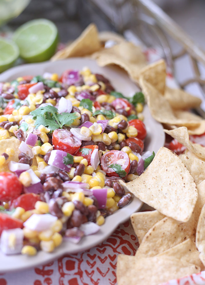 Black Bean & Corn Salsa with a creamy lime dressing. SO easy and so fresh.