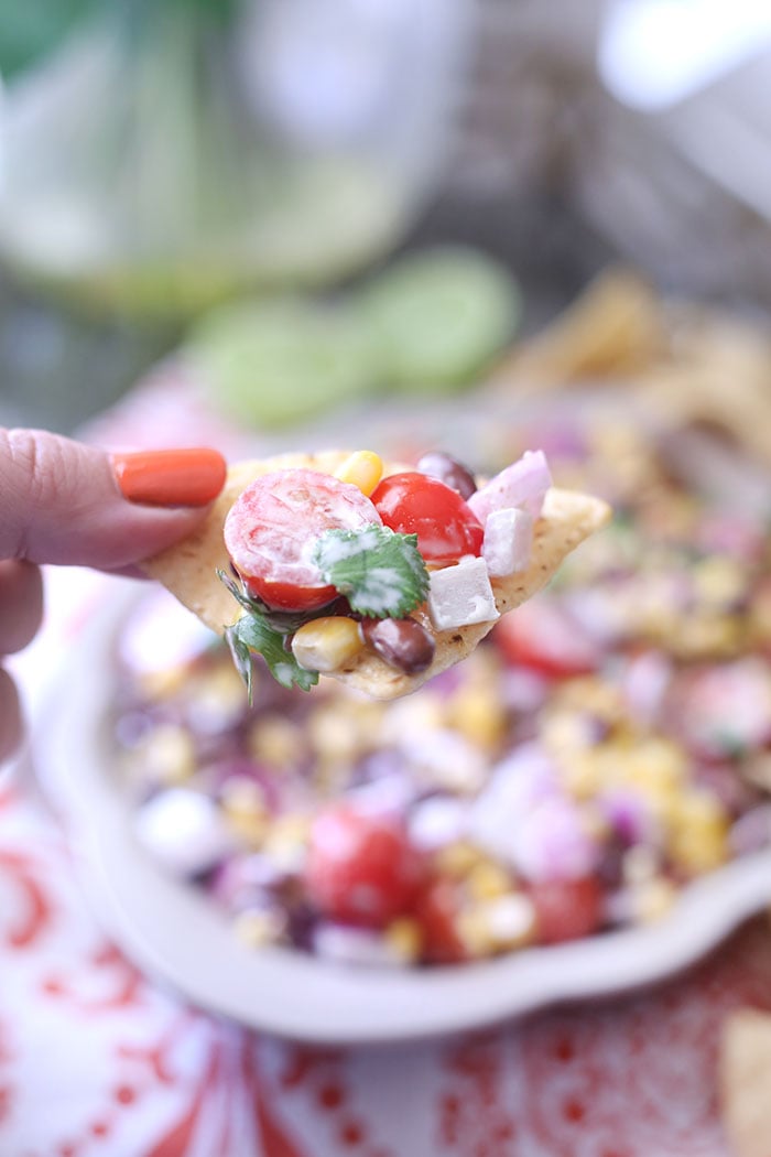 Black Bean & Corn Salsa with a creamy lime dressing. SO easy and so fresh.