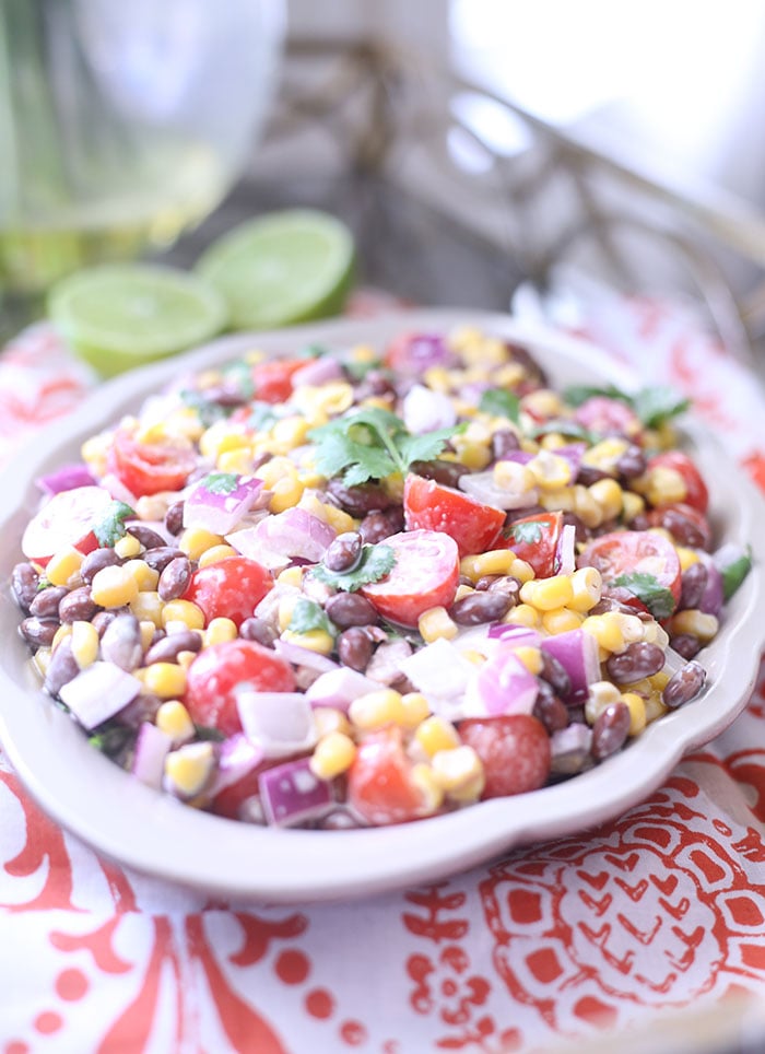 Black Bean & Corn Salsa with a creamy lime dressing. SO easy and so fresh.