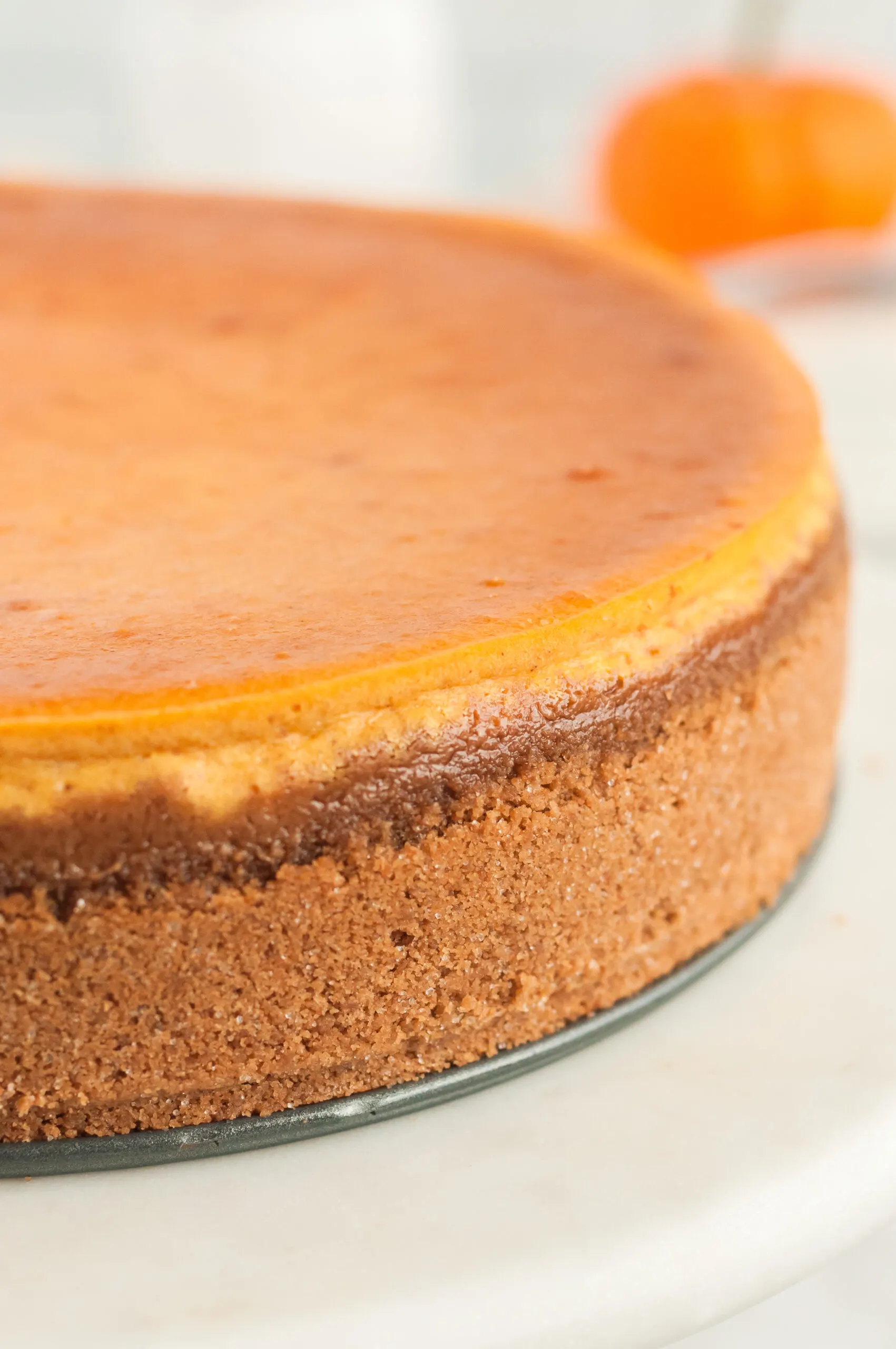 delicious pumpkin cheesecake fresh out of the oven. crusted layers