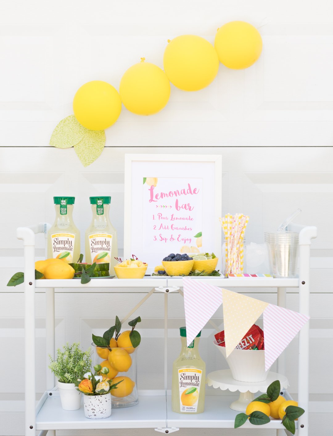 Lemonade Bar Cart Ideas. Best of summer all on one bar cart from lemonade to amazing garnishes.