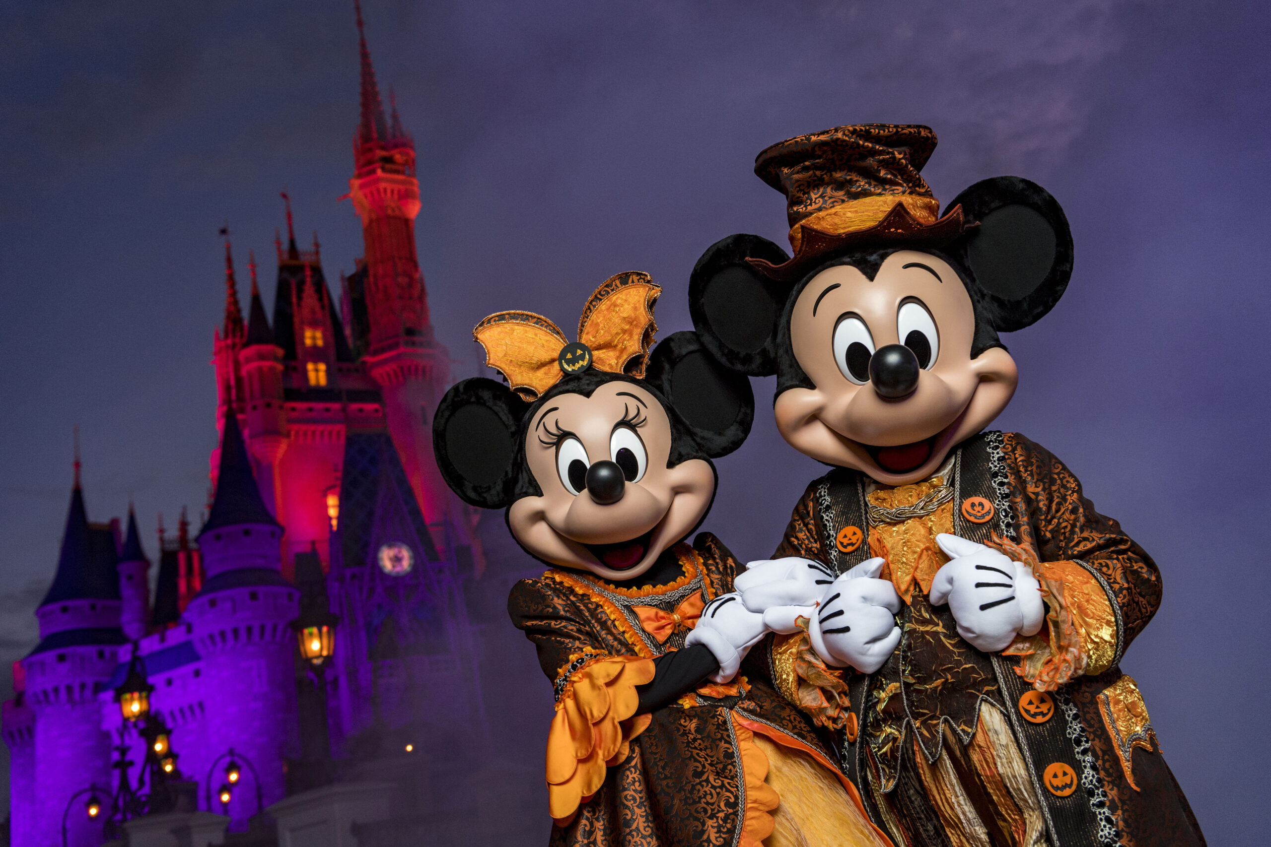 Minnie and Mickey Mouse Dressed up in Halloween Costumes