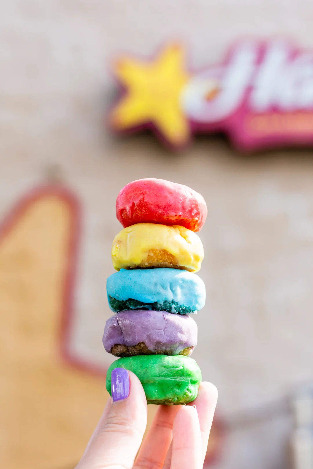 Froot Loop donuts exist and you need to get them at Hardees now before they are gone.