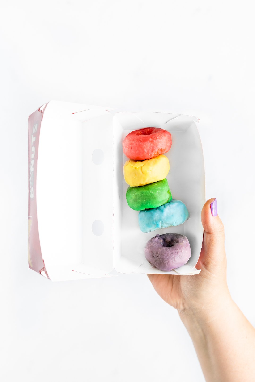 Froot Loop donuts exist and you need to get them at Hardees now before they are gone.