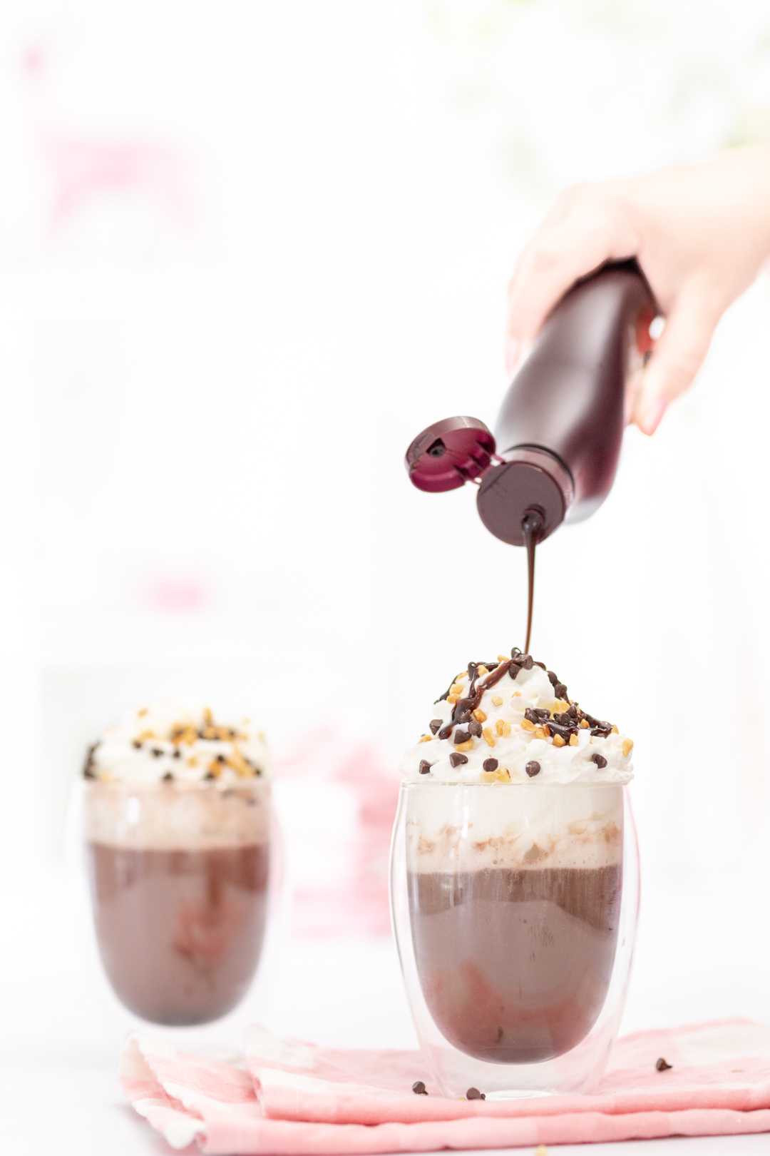 chocolate drizzled on top of hot chocolate