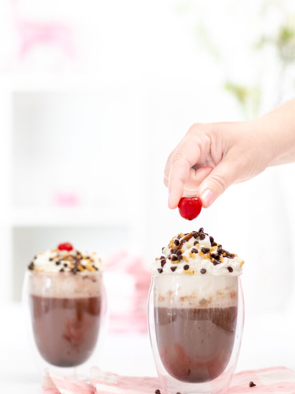 banana split hot cocoa with a cherry on top