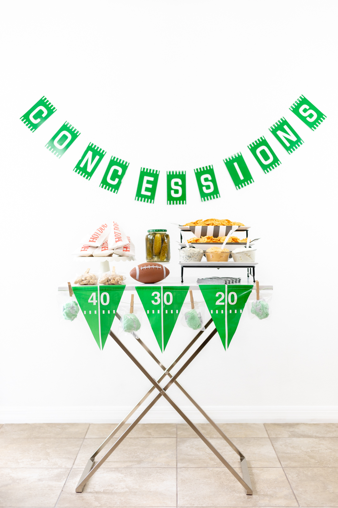 concession stand banner and butler tray of snacks