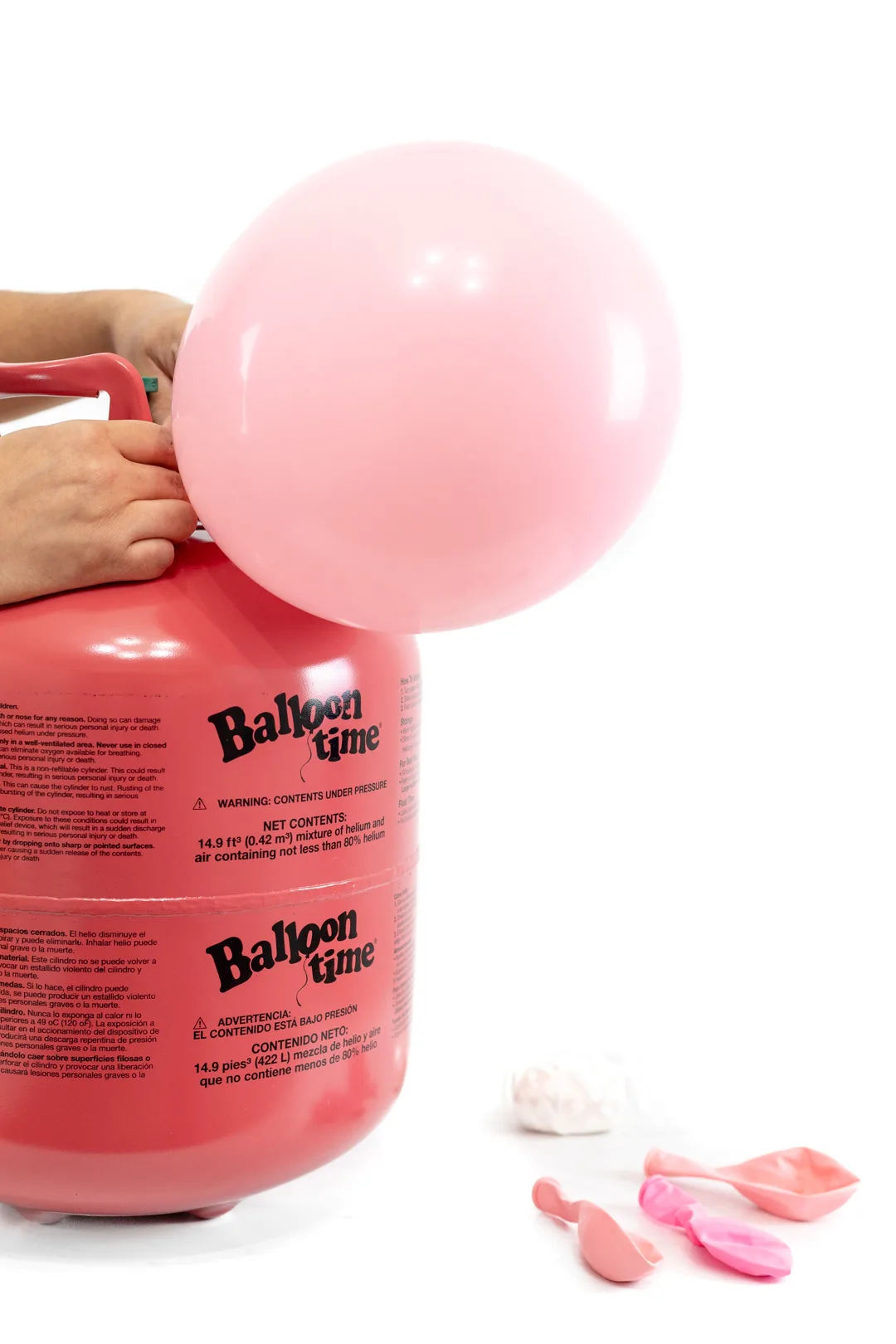 Balloon Time Tank with pink balloon getting inflated for party.