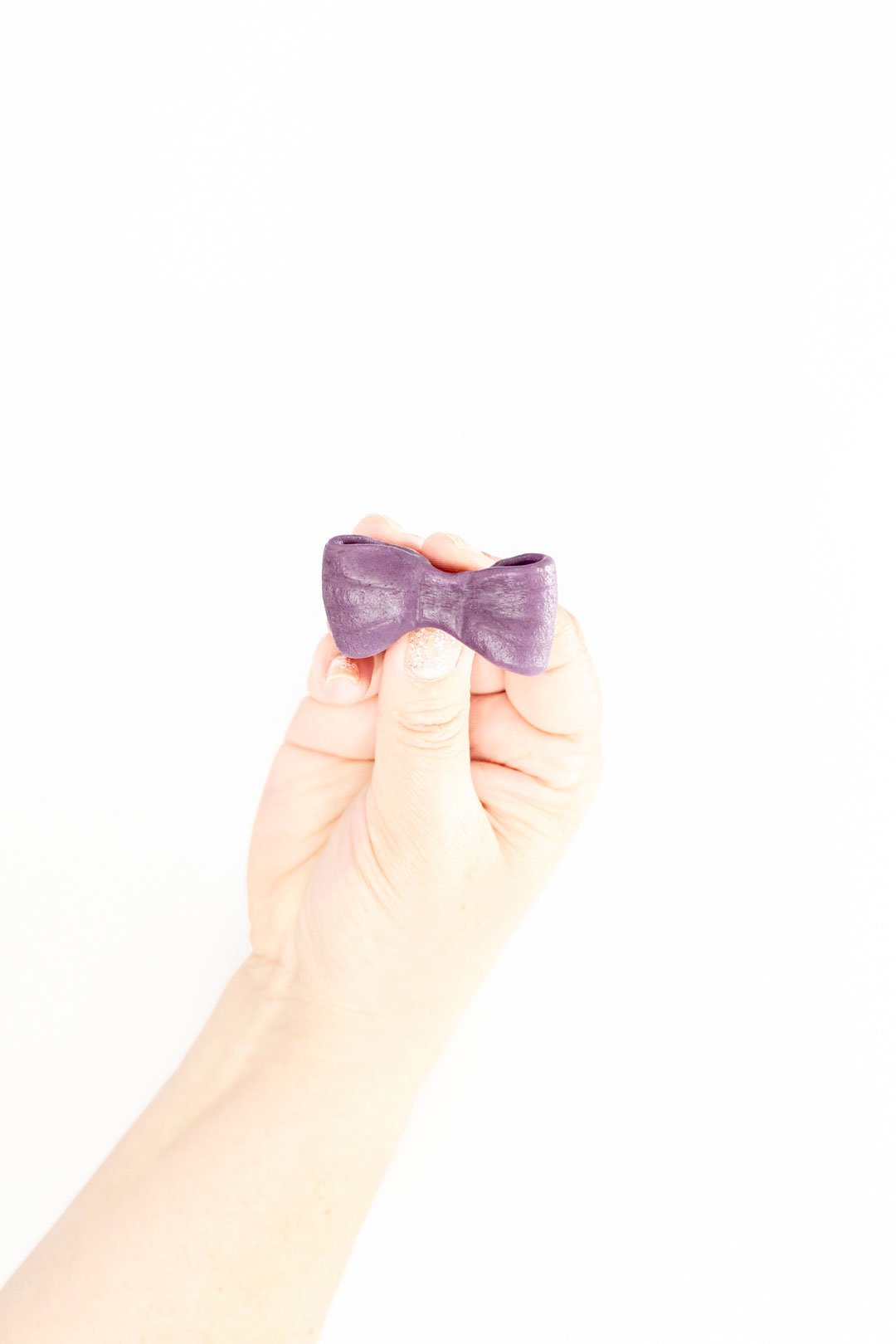 Edible Potion Purple Disney inspired bow made out of Grape Airheads