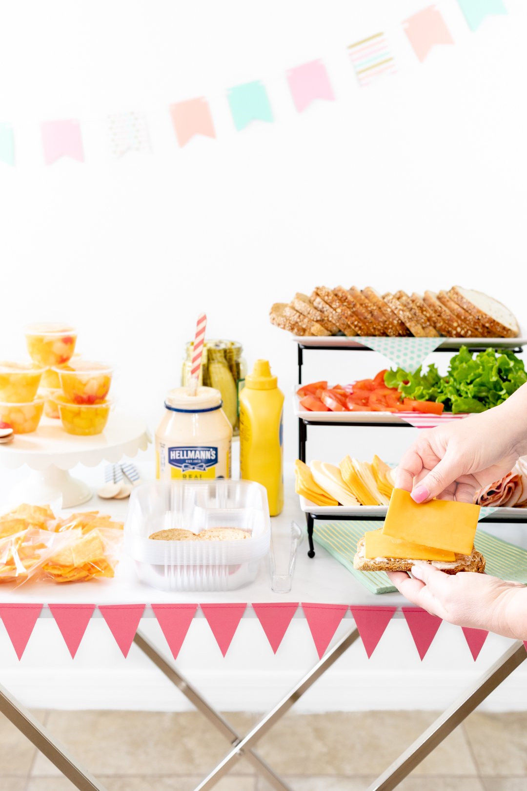 creating sandwich at sandwich buffet