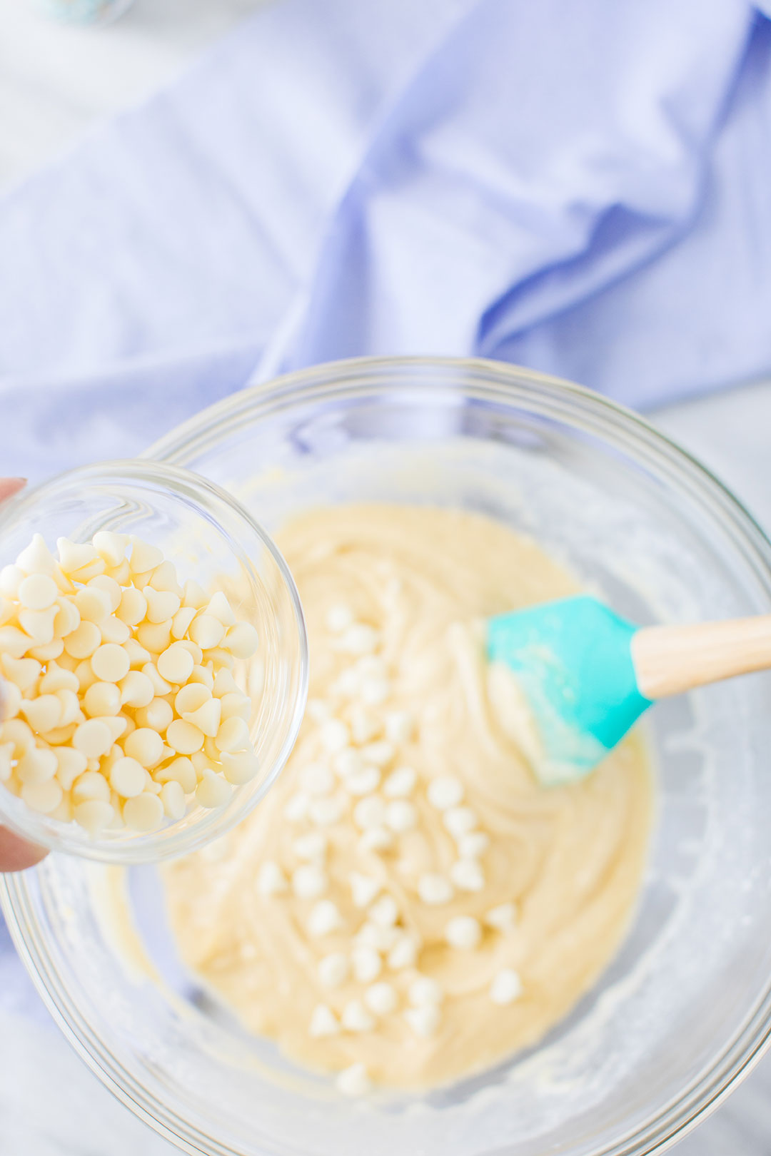 pastel colored sprinkles in a spoon