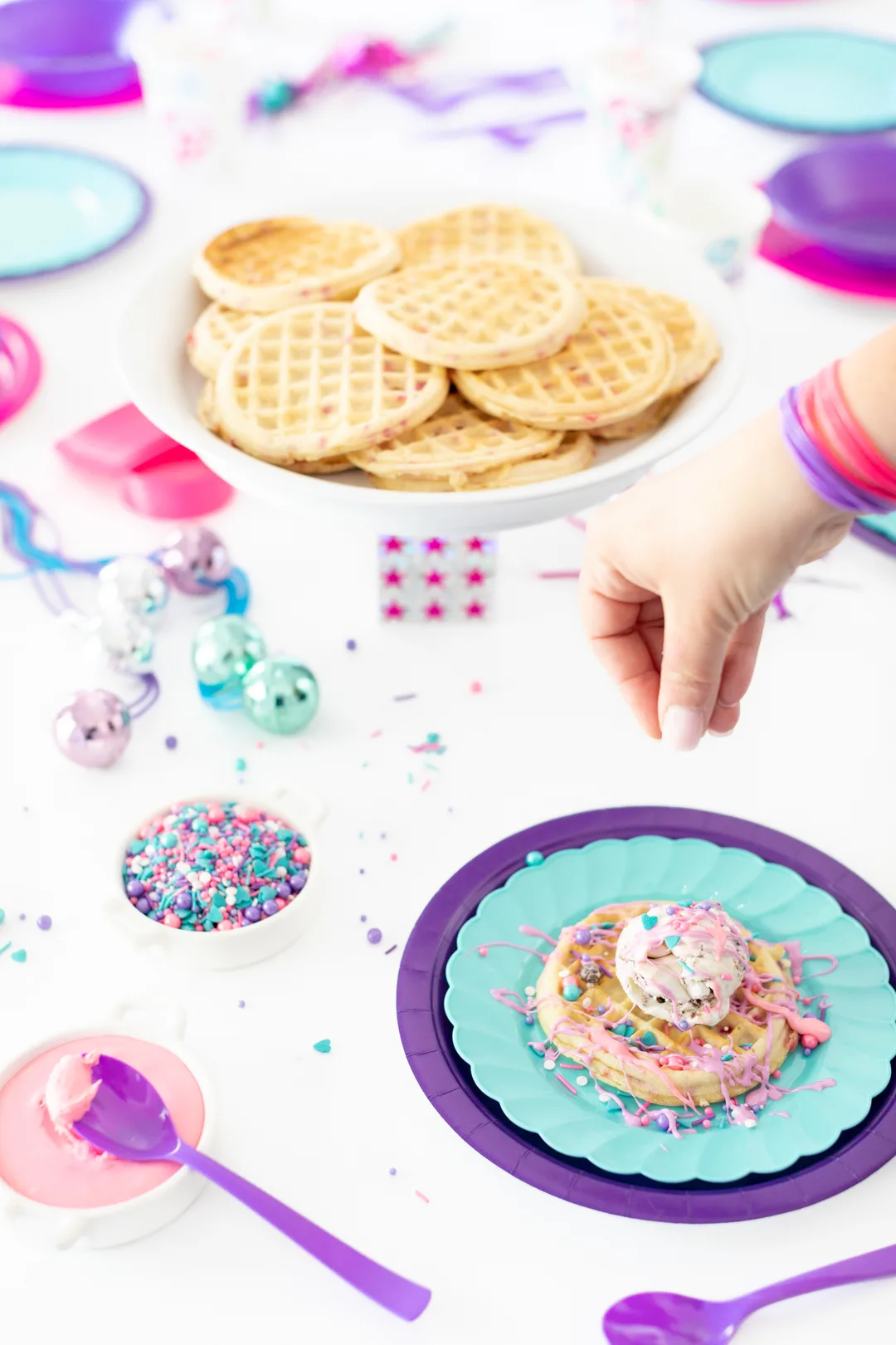 adding sprinkles to waffle creation