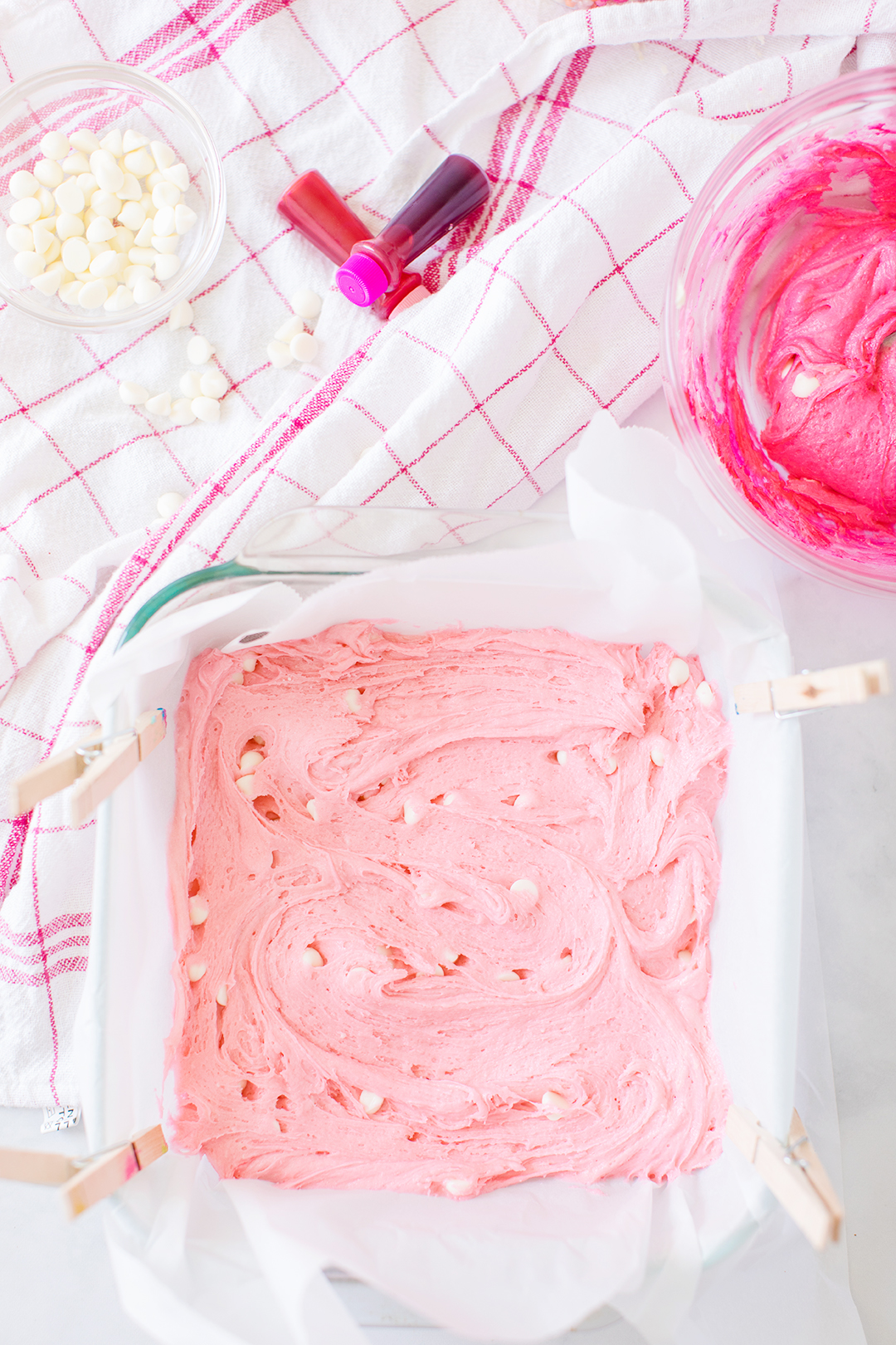 pink blondie batter in baking dish