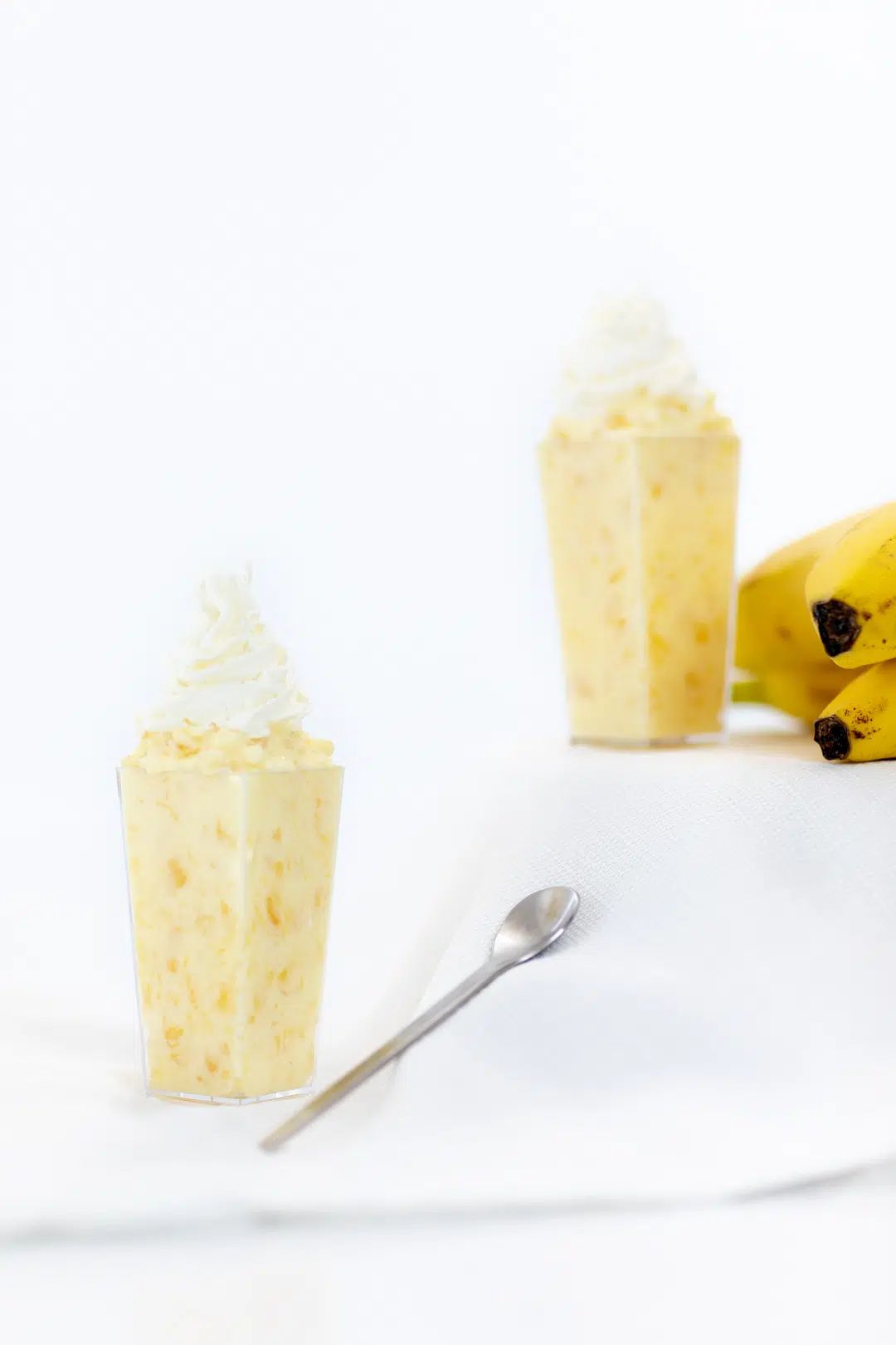 mini desserts in mini serving cups with small spoons