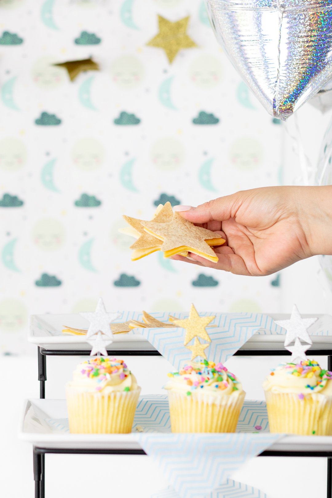 Star sandwiches being placed on party display