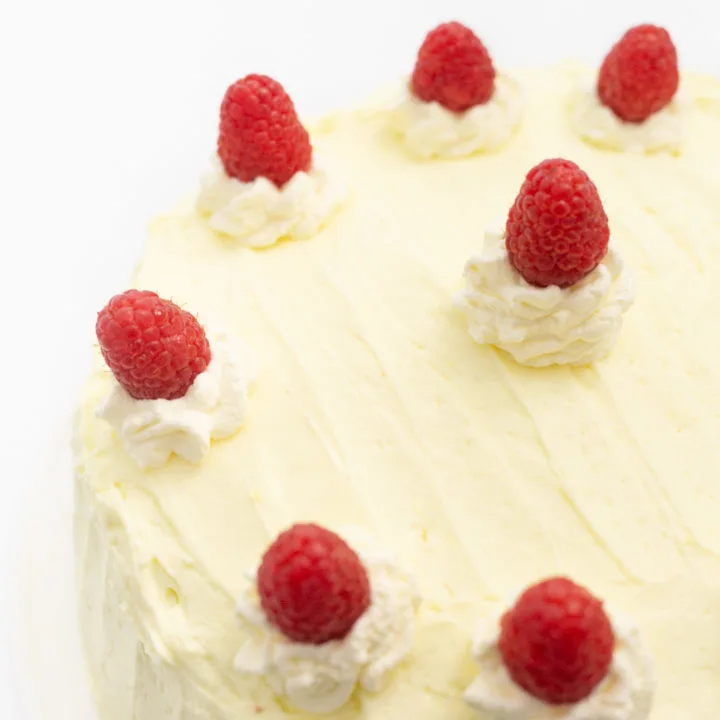 Whipped Lemon Frosting with Fresh Raspberries and Whipped Cream