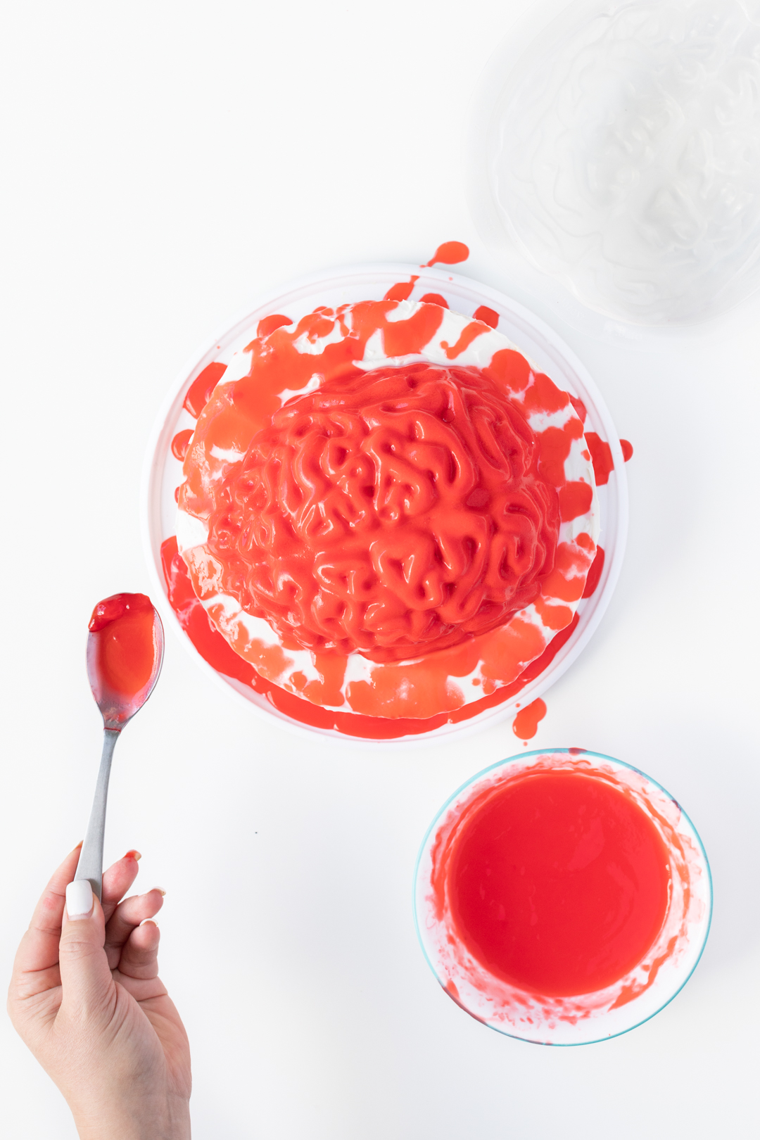 Over the top view of a bloody brain cake.