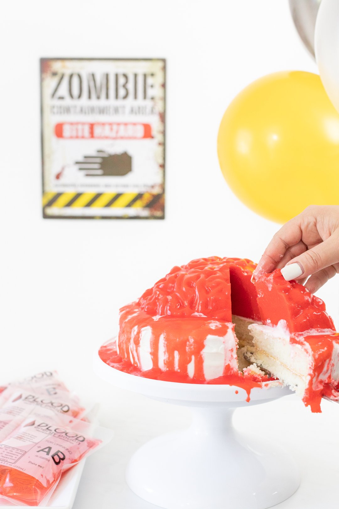 Slice of bloody brain cake made with a brain gelatin mold.
