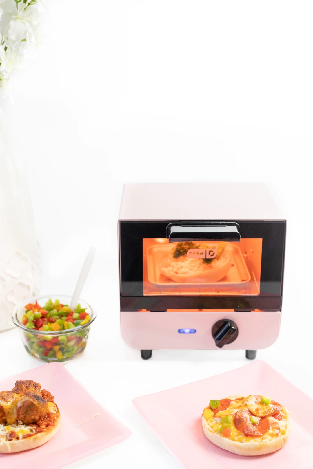 Mini Toaster Oven toasting an english muffin pizza