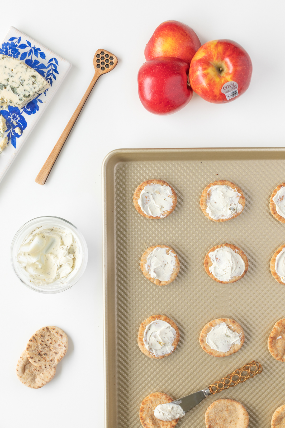 Cream cheese spread over mini pitas