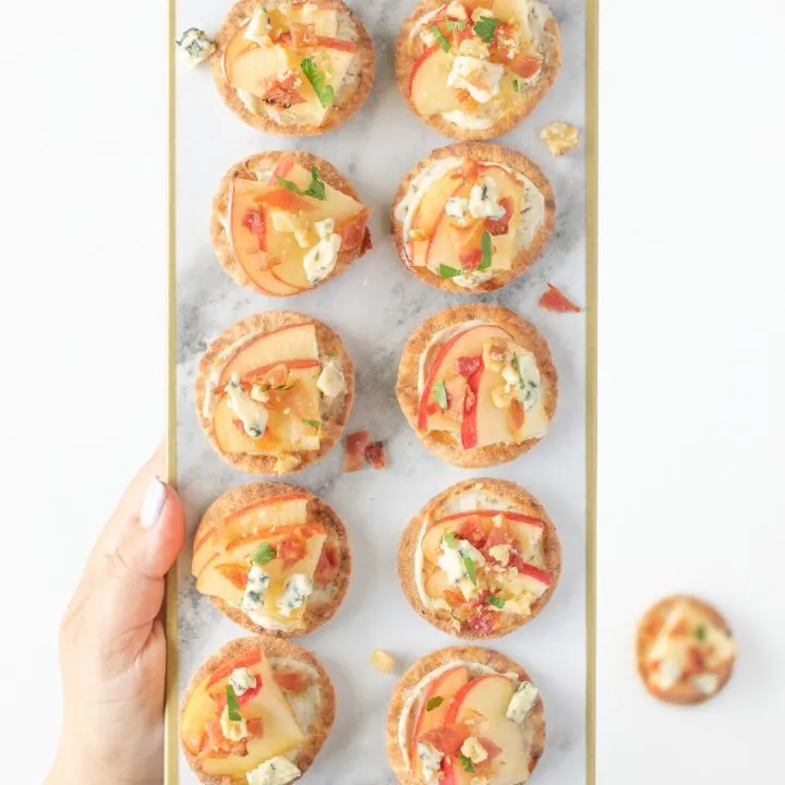 Tray of mini pita appetizers to serve to guests