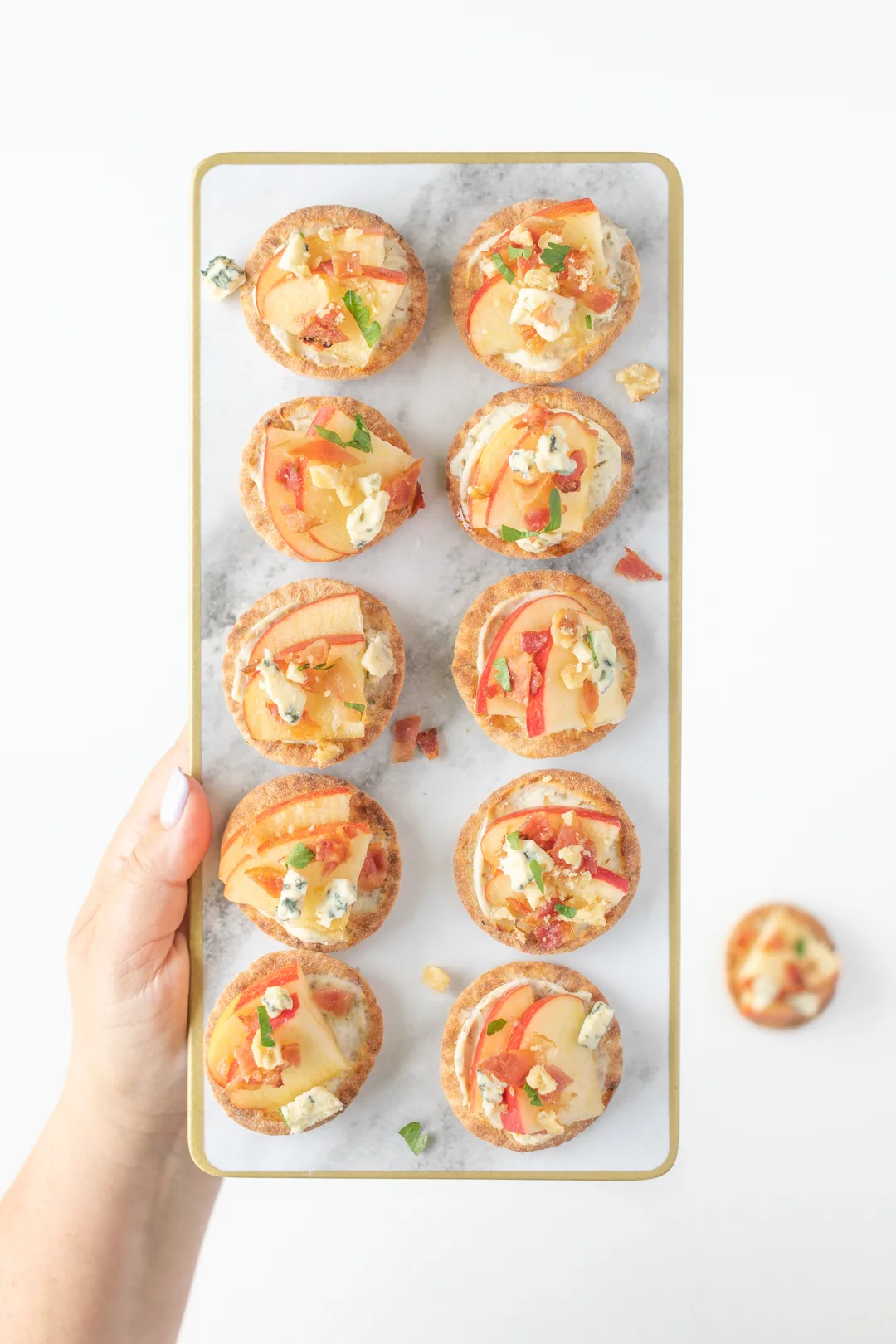 Tray of mini pita appetizers to serve to guests