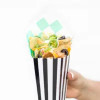 nachos served in a popcorn box
