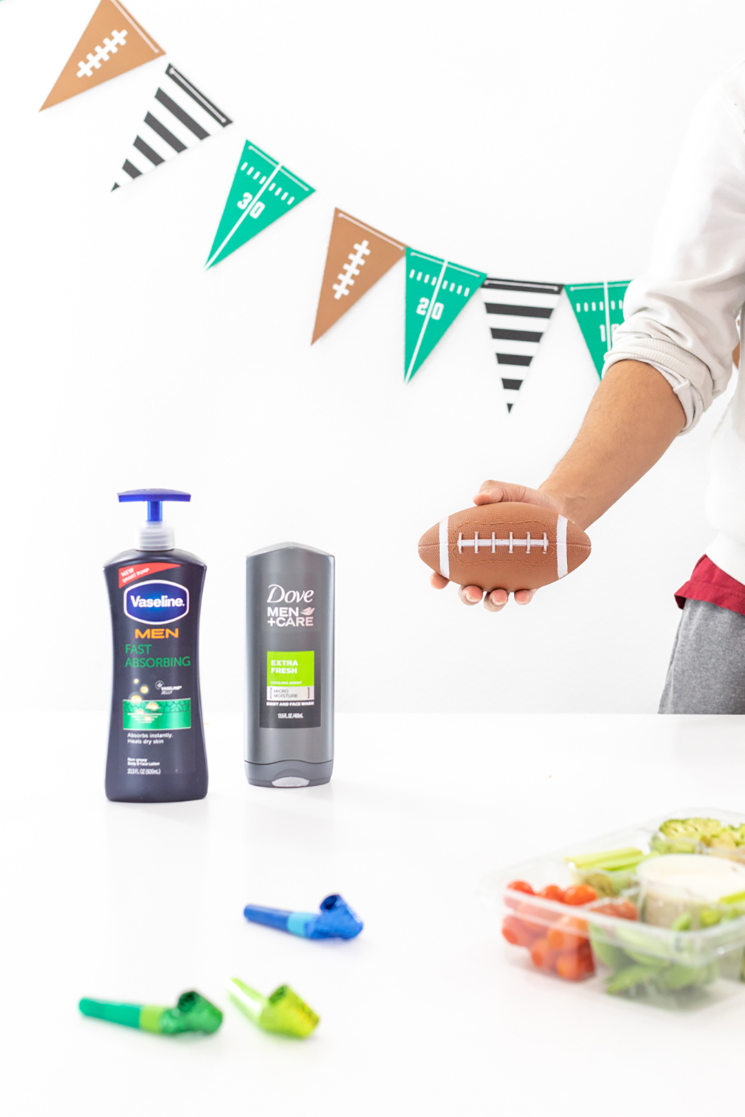 Game Day Table with Football Decorations and mini football.