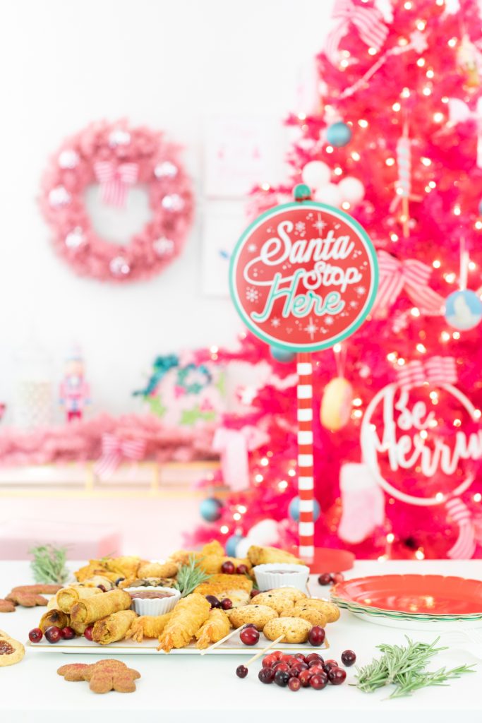 Santa Stop Here Party Sign and holiday snack board spread