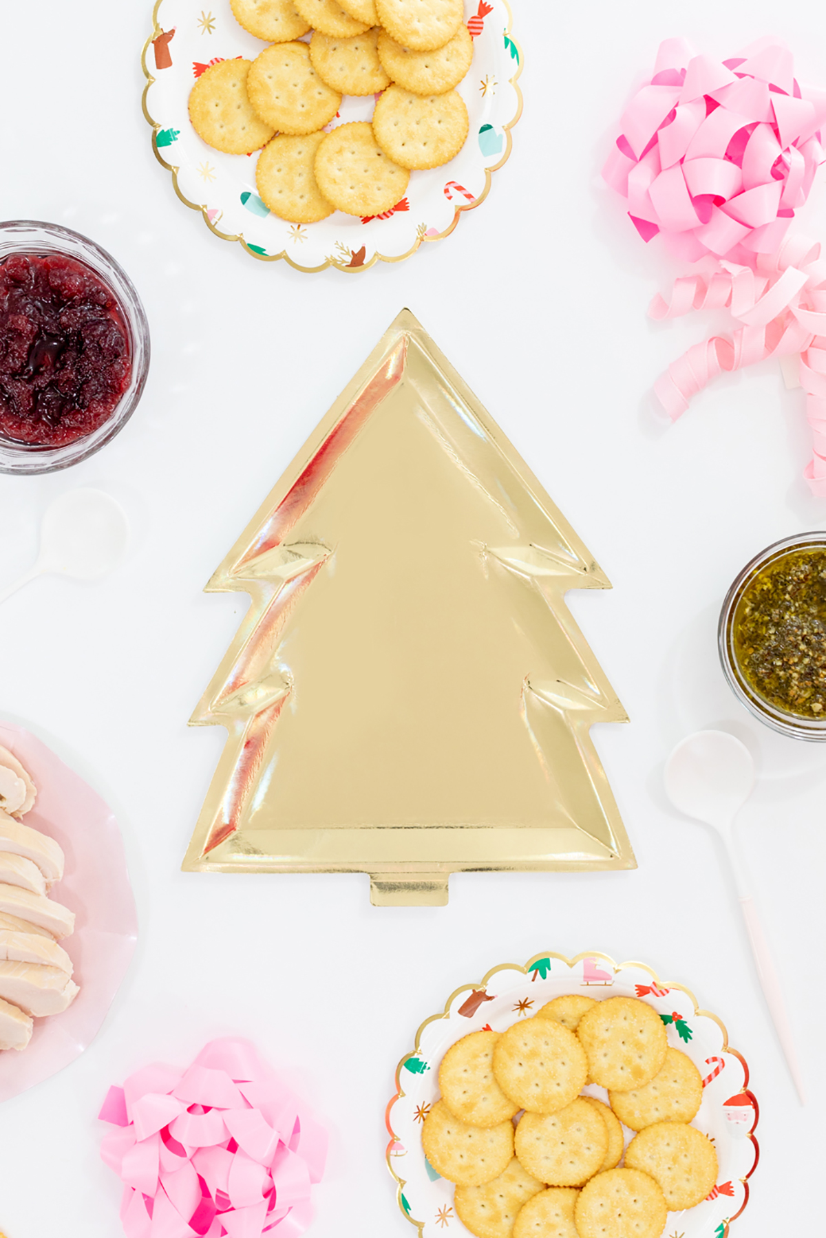 Gold Christmas tree plate and fixings to make cracker sandwich appetizers