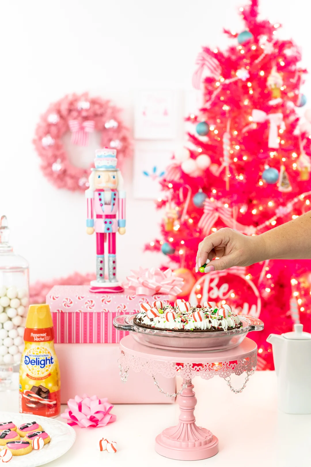 customizing frozen pie with holiday sprinkles