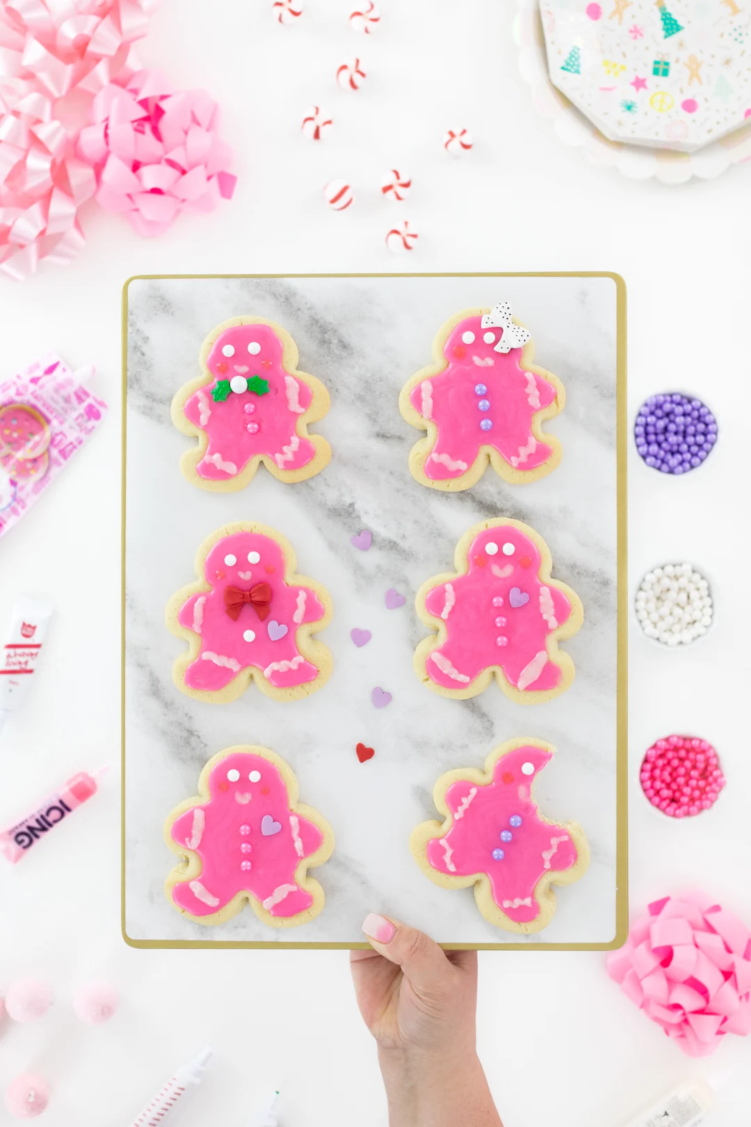 cute pink sugar cookies shaped like gingerbread men