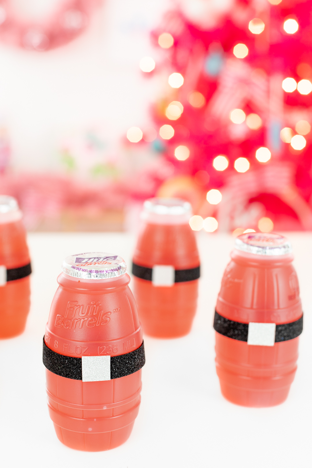 Santa Belt Drinks. Single serve drinks with santa belts.