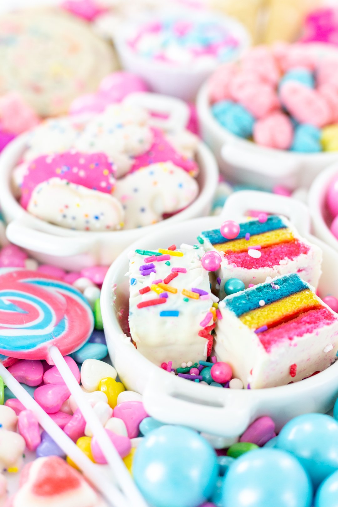 birthday platter with pretty colored cakes and candies