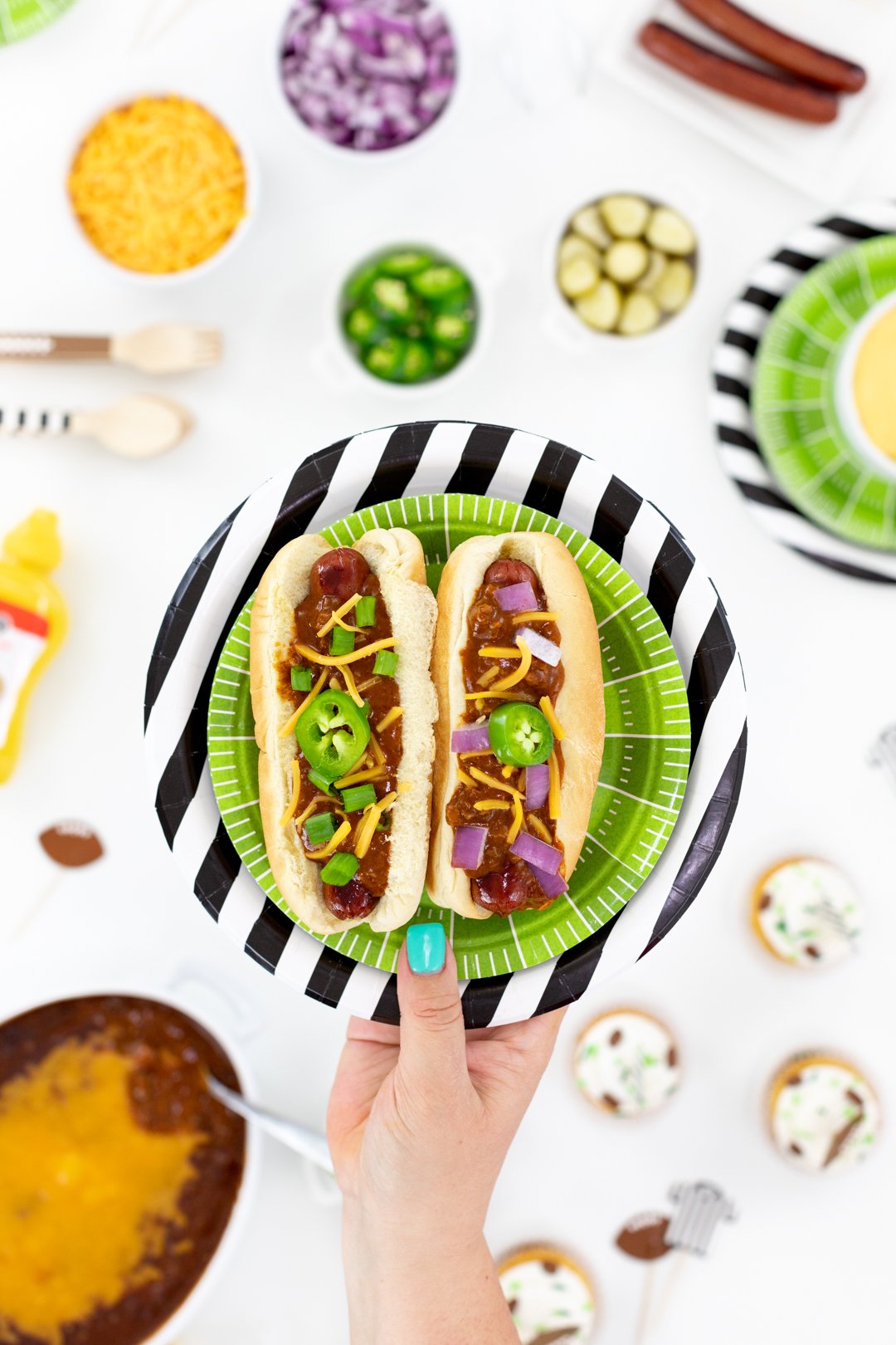 Chili dogs for game day. Football food spread.