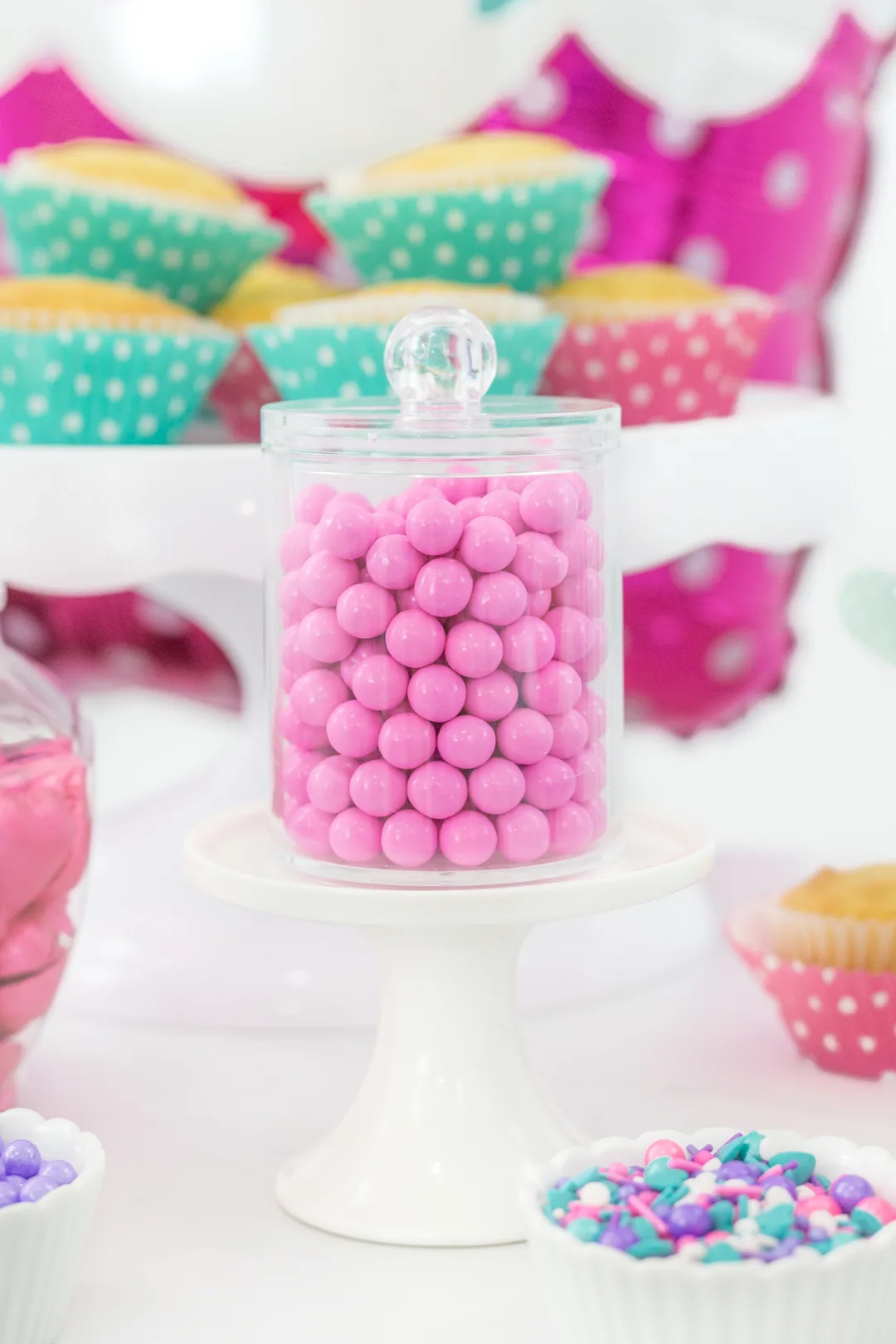 candy jar with pink sixlets