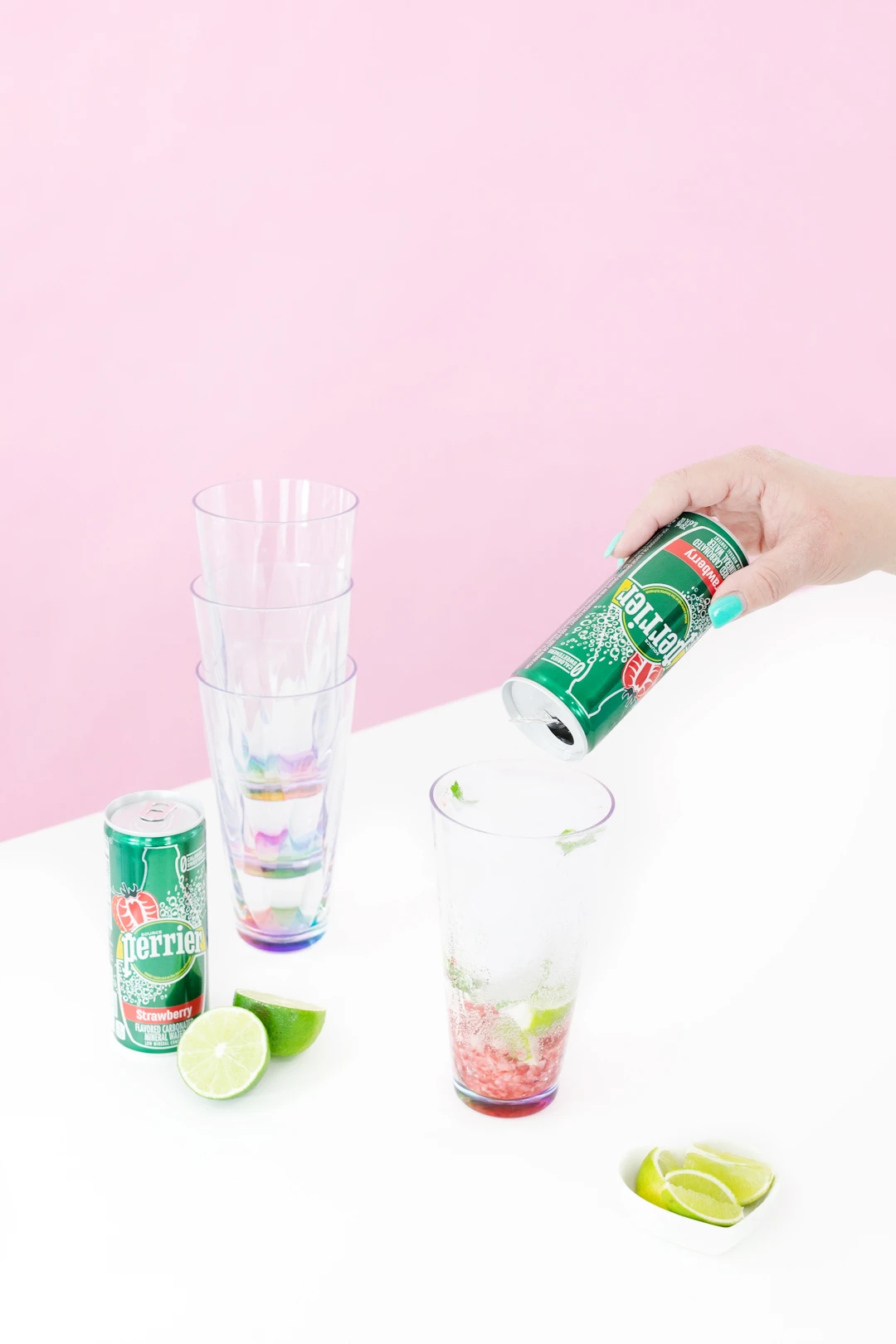 pouring can of perrier into cup