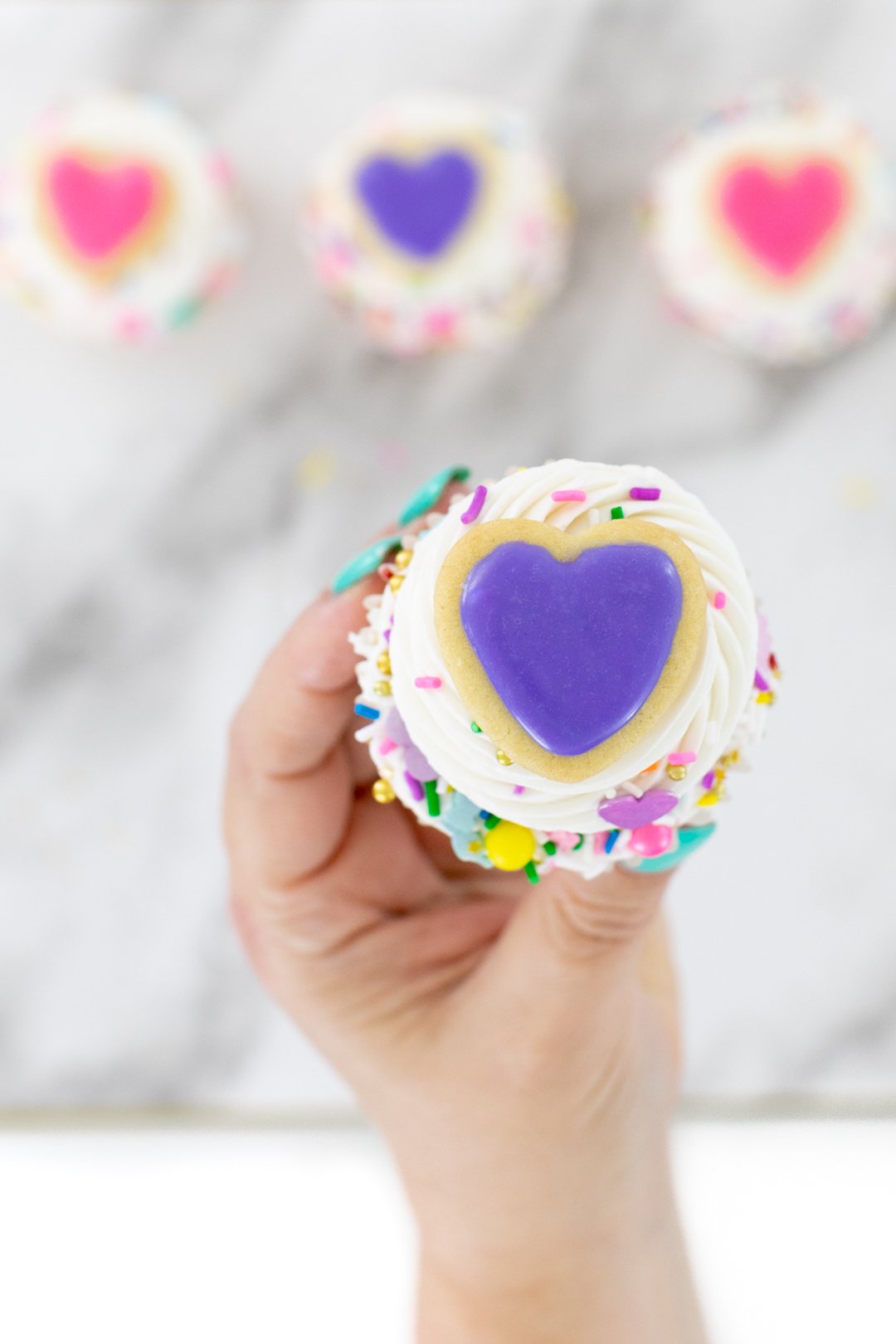 Mini Heart Cookie on top of cupcake