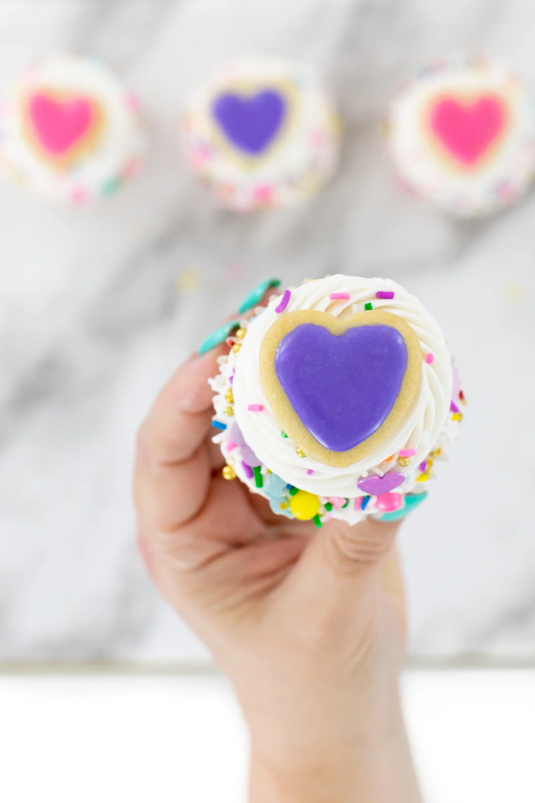 Mini Heart Cookie on top of cupcake