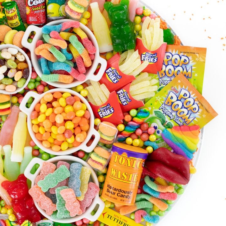 candy board with gummy worms and big sour patch kids