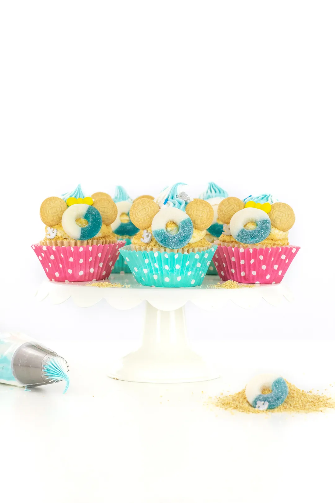 disney cruise cupcakes with polka dot cupcake wrappers pink and teal