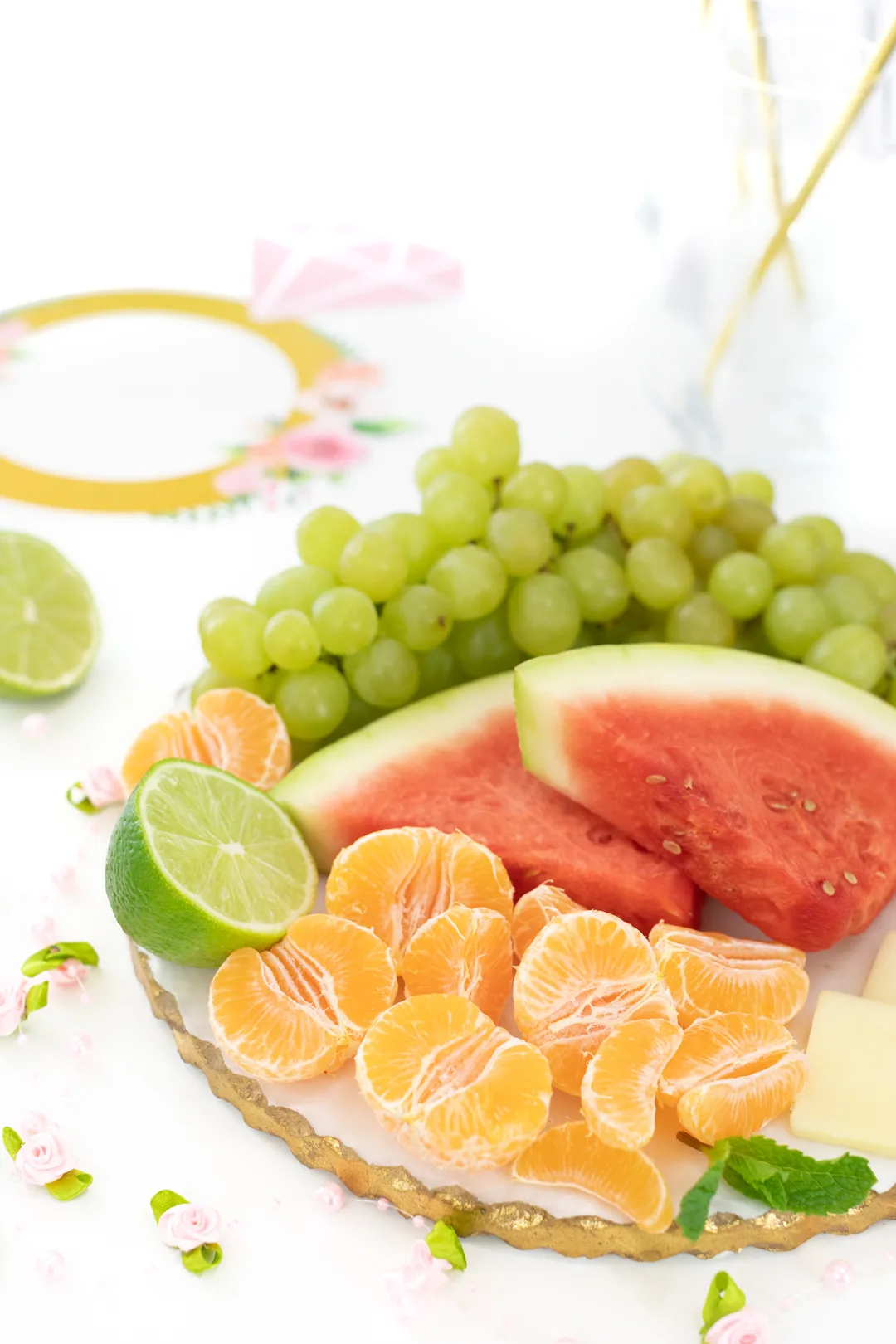 fruit tray with grapes, mandarin oranges and watermelon