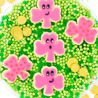 pink st. patrick's day cookies with funny faces and polkadots