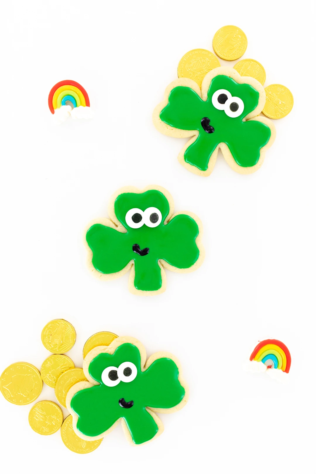 st. patrick's day cookies, chocolate gold coins and rainbow gummies