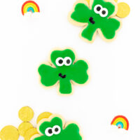st. patrick's day cookies, chocolate gold coins and rainbow gummies
